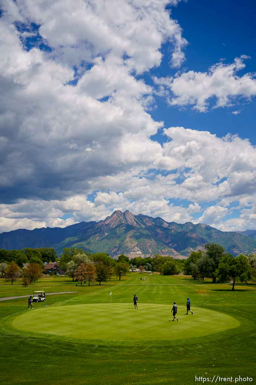 (Trent Nelson  |  The Salt Lake Tribune) Golfers on the ninth hole at Mick Riley Golf Course in Murray on Saturday, June 26, 2021.