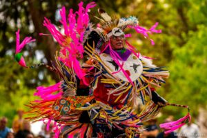 (Trent Nelson  |  The Salt Lake Tribune) Shon Taylor performs a fancy dance during an intertribal pow wow at the Living Traditions festival in Salt Lake City on Saturday, June 26, 2021.