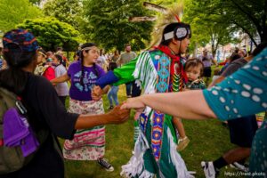 (Trent Nelson  |  The Salt Lake Tribune) The crowd joins dancers in a friendship dance during an intertribal pow wow at the Living Traditions festival in Salt Lake City on Saturday, June 26, 2021.