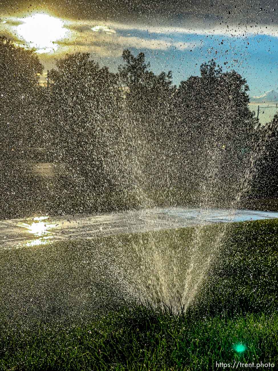 (Trent Nelson  |  The Salt Lake Tribune) Spinning sprinkler in Salt Lake City on Tuesday, June 29, 2021.