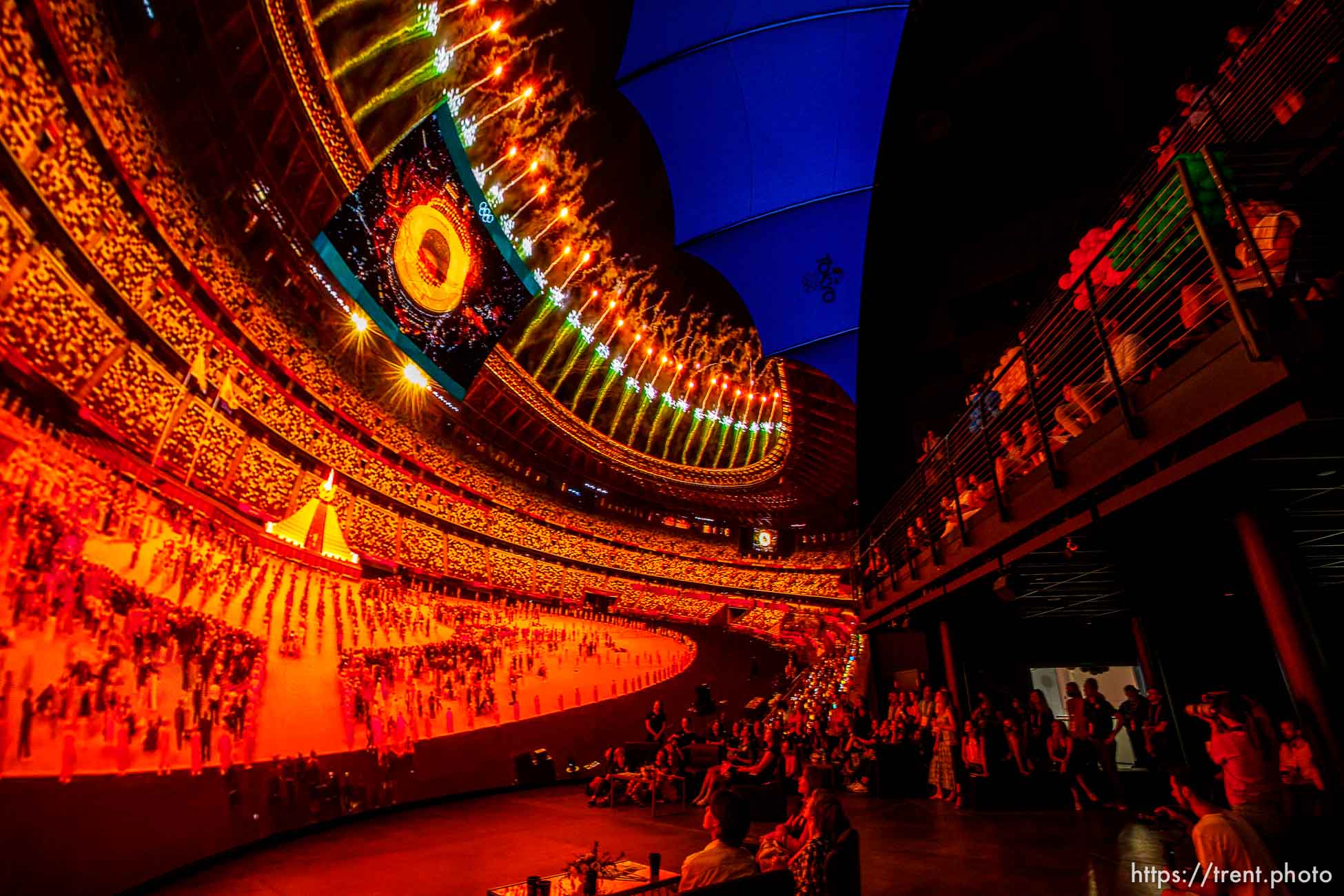 (Trent Nelson  |  The Salt Lake Tribune) A crowd immersed in scenes from the Olympics displayed on a 180 degree 8K LED dome at the Cosm Experience Center in Salt Lake City on Friday, July 30, 2021.