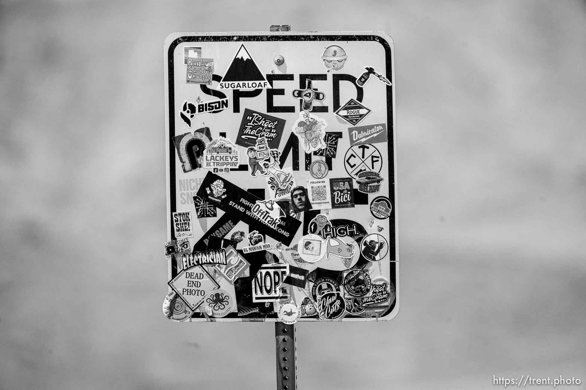 (Trent Nelson  |  The Salt Lake Tribune) A speed limit sign plastered with stickers at the Bonneville Salt Flats on Saturday, July 31, 2021.