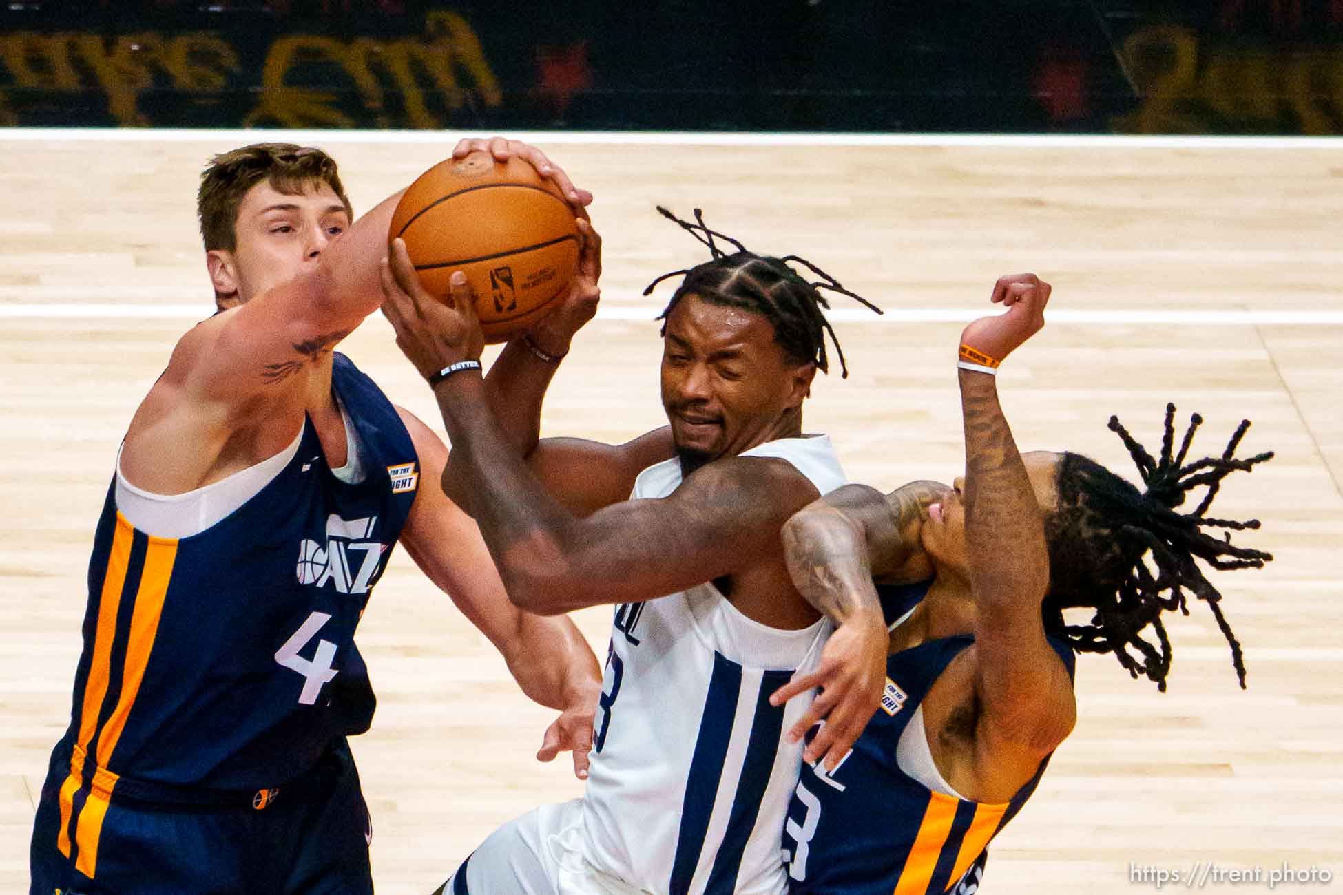 (Trent Nelson  |  The Salt Lake Tribune) Utah Jazz White guard/forward Elijah Hughes (33) is defended by Utah Jazz Blue forward Nate Sestina (42) and Utah Jazz Blue guard Kyle Allman (43) as Utah Jazz Blue faces Utah Jazz White in the Salt Lake City Summer League in Salt Lake City on Friday, Aug. 6, 2021.