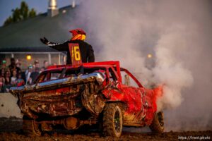 (Trent Nelson  |  The Salt Lake Tribune) Dalton Gullo took second place in stock, despite his smoking car, during Punishment at the Peak, a demolition derby in Grantsville on Saturday, Aug. 7, 2021.