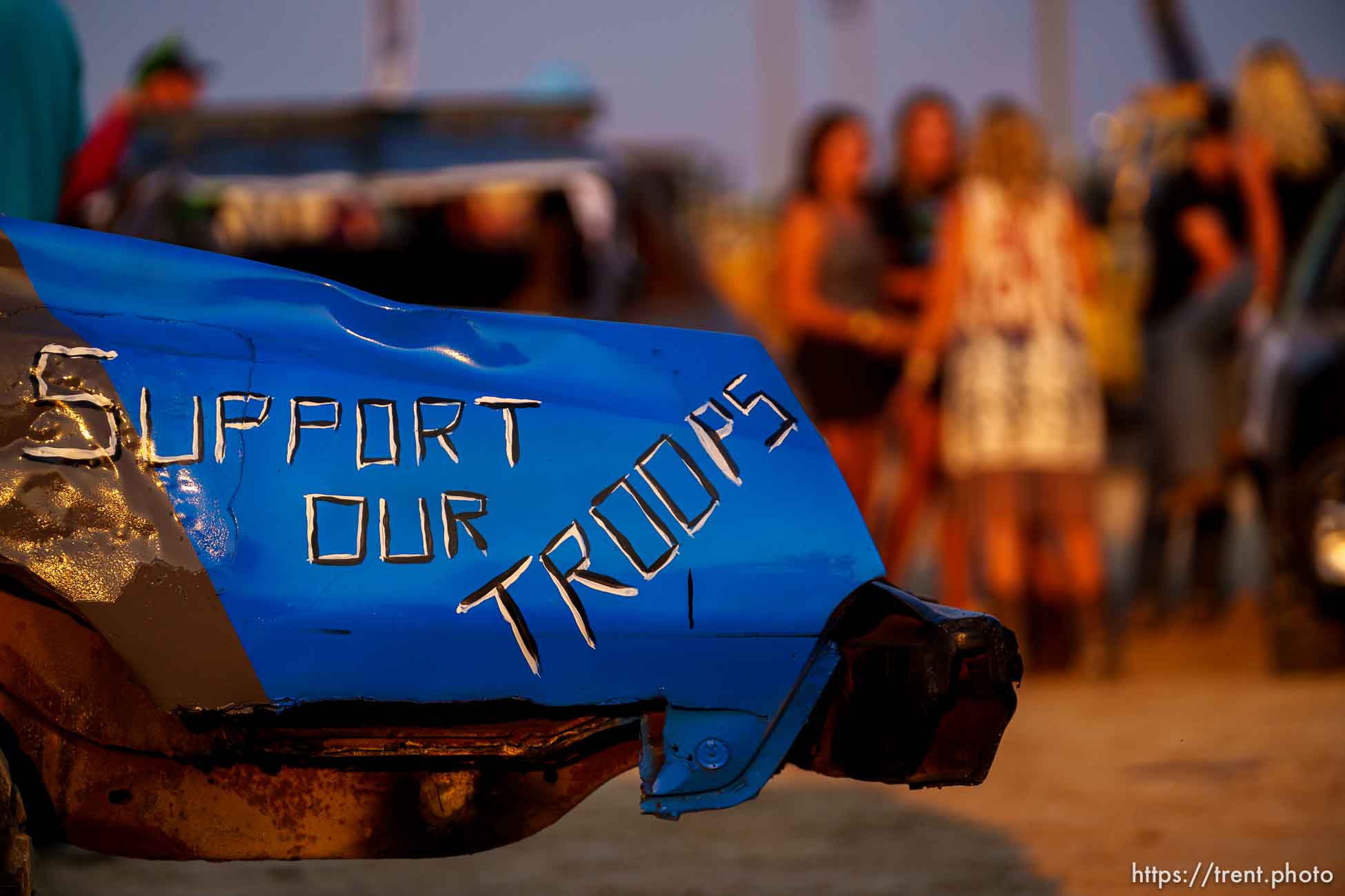 (Trent Nelson  |  The Salt Lake Tribune) Support our troops. Punishment at the Peak, a demolition derby in Grantsville on Saturday, Aug. 7, 2021.