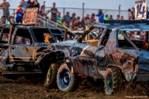 (Trent Nelson  |  The Salt Lake Tribune) Anthony Trippler and Taylor Hunt collide during Punishment at the Peak, a demolition derby in Grantsville on Saturday, Aug. 7, 2021.