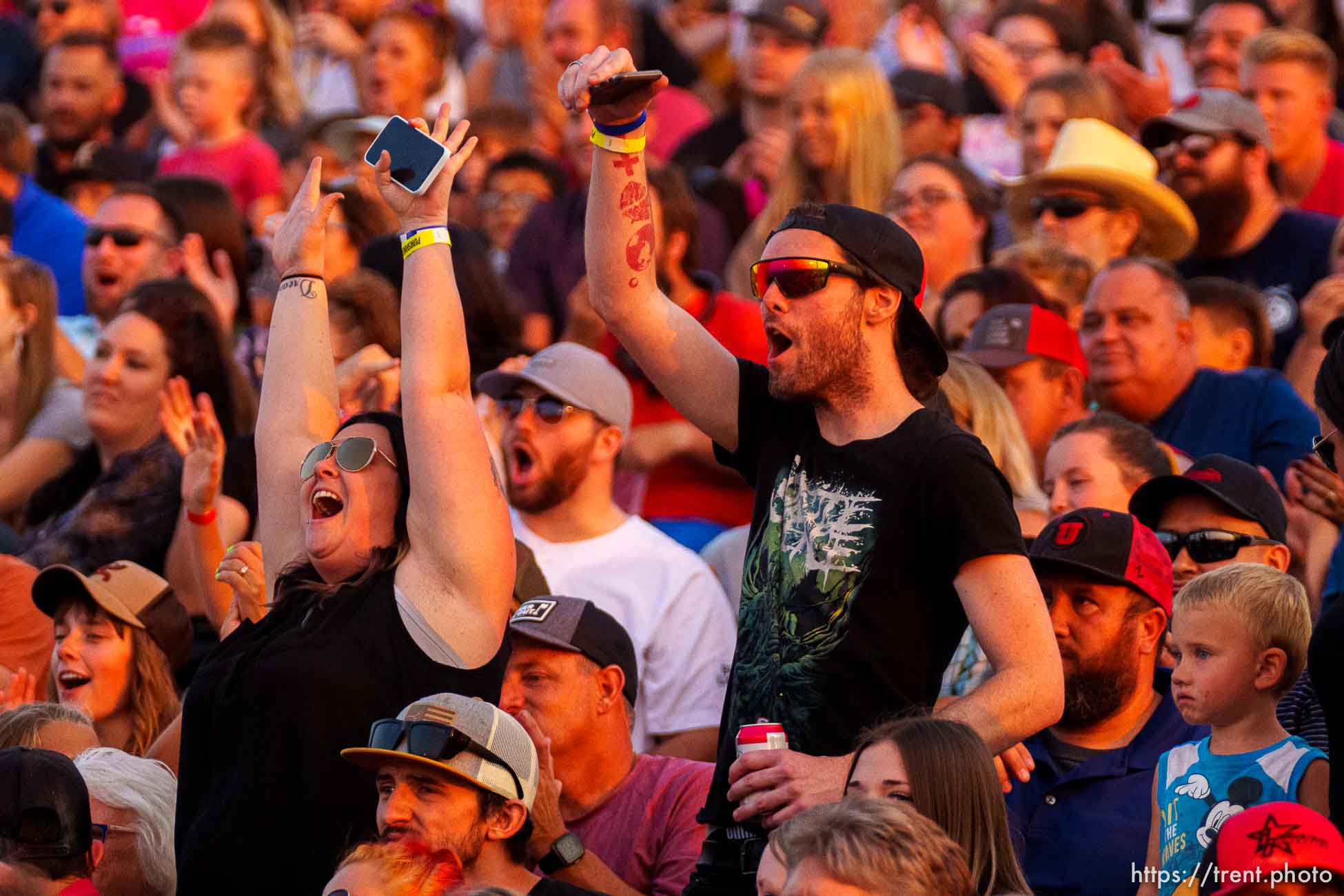 (Trent Nelson  |  The Salt Lake Tribune) Fans cheer at Punishment at the Peak, a demolition derby in Grantsville on Saturday, Aug. 7, 2021.