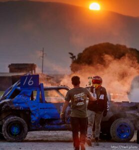 (Trent Nelson  |  The Salt Lake Tribune) Dalton Gullo is handed a trophy during Punishment at the Peak, a demolition derby in Grantsville on Saturday, Aug. 7, 2021.