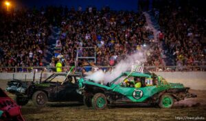 (Trent Nelson  |  The Salt Lake Tribune) Barry Passmore and Andrew Anderson during Punishment at the Peak, a demolition derby in Grantsville on Saturday, Aug. 7, 2021. 21, 810