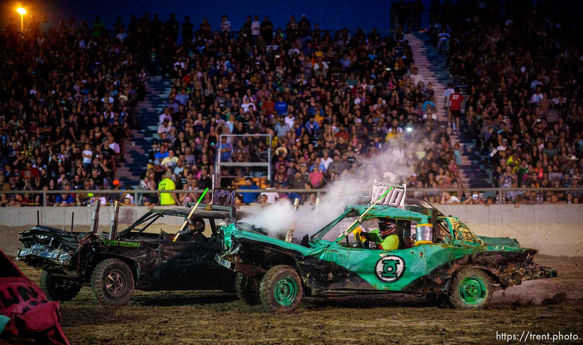 (Trent Nelson  |  The Salt Lake Tribune) Barry Passmore and Andrew Anderson during Punishment at the Peak, a demolition derby in Grantsville on Saturday, Aug. 7, 2021. 21, 810