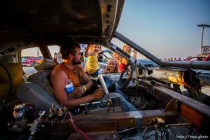 (Trent Nelson  |  The Salt Lake Tribune) Zeb Smith gets a sendoff from his family before competing at Punishment at the Peak, a demolition derby in Grantsville on Saturday, Aug. 7, 2021.