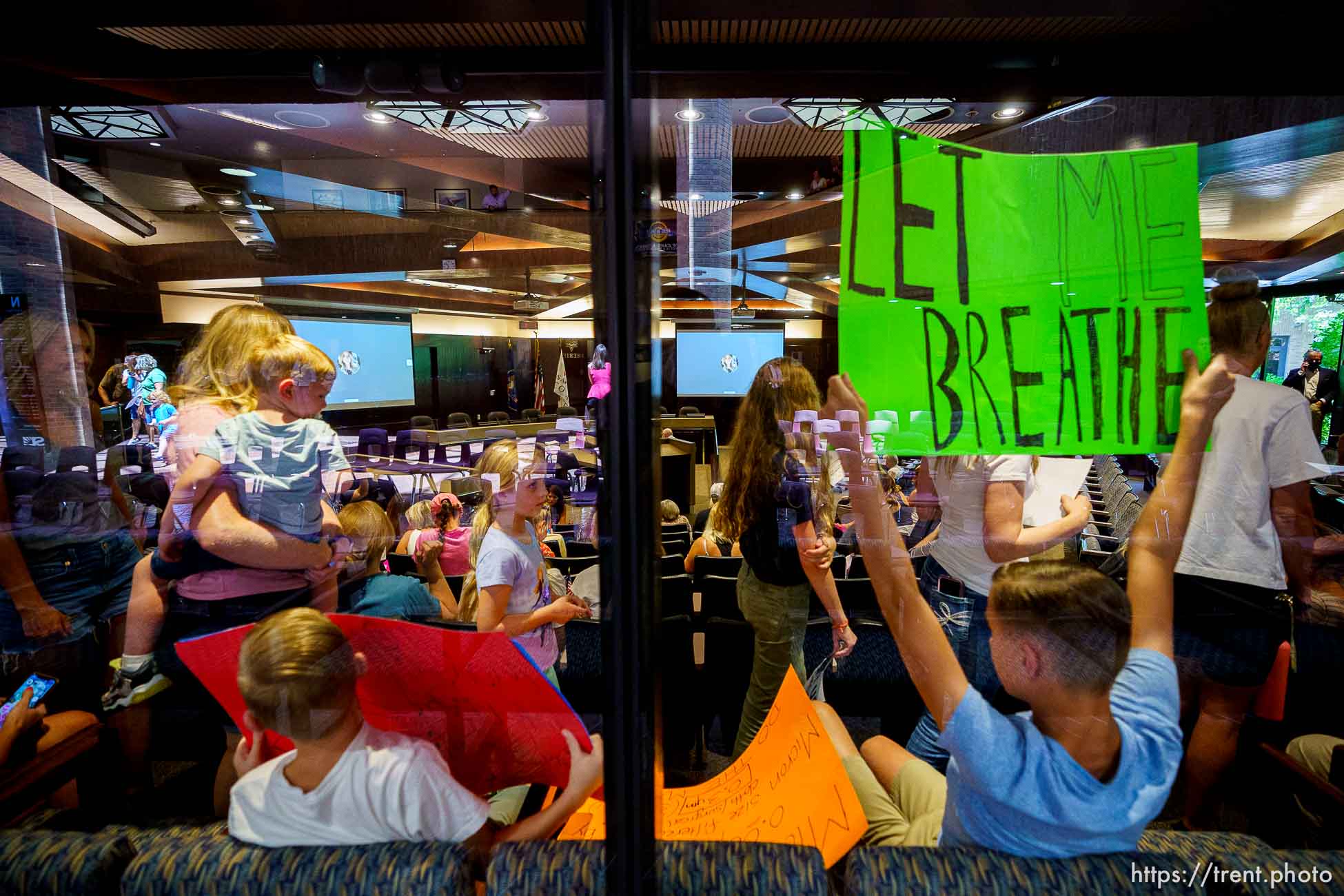 (Trent Nelson  |  The Salt Lake Tribune) People fill the room as the Salt Lake County Council voted down Dr. Angela Dunn's mask ordinance for K-6 students, on Thursday, Aug. 12, 2021.