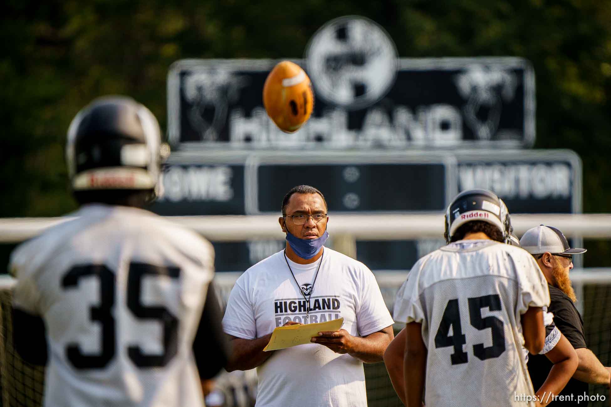 (Trent Nelson  |  The Salt Lake Tribune) Football coach Kautai Olevao directs practice at Highland High School in Salt Lake City on Thursday, Aug. 19, 2021.