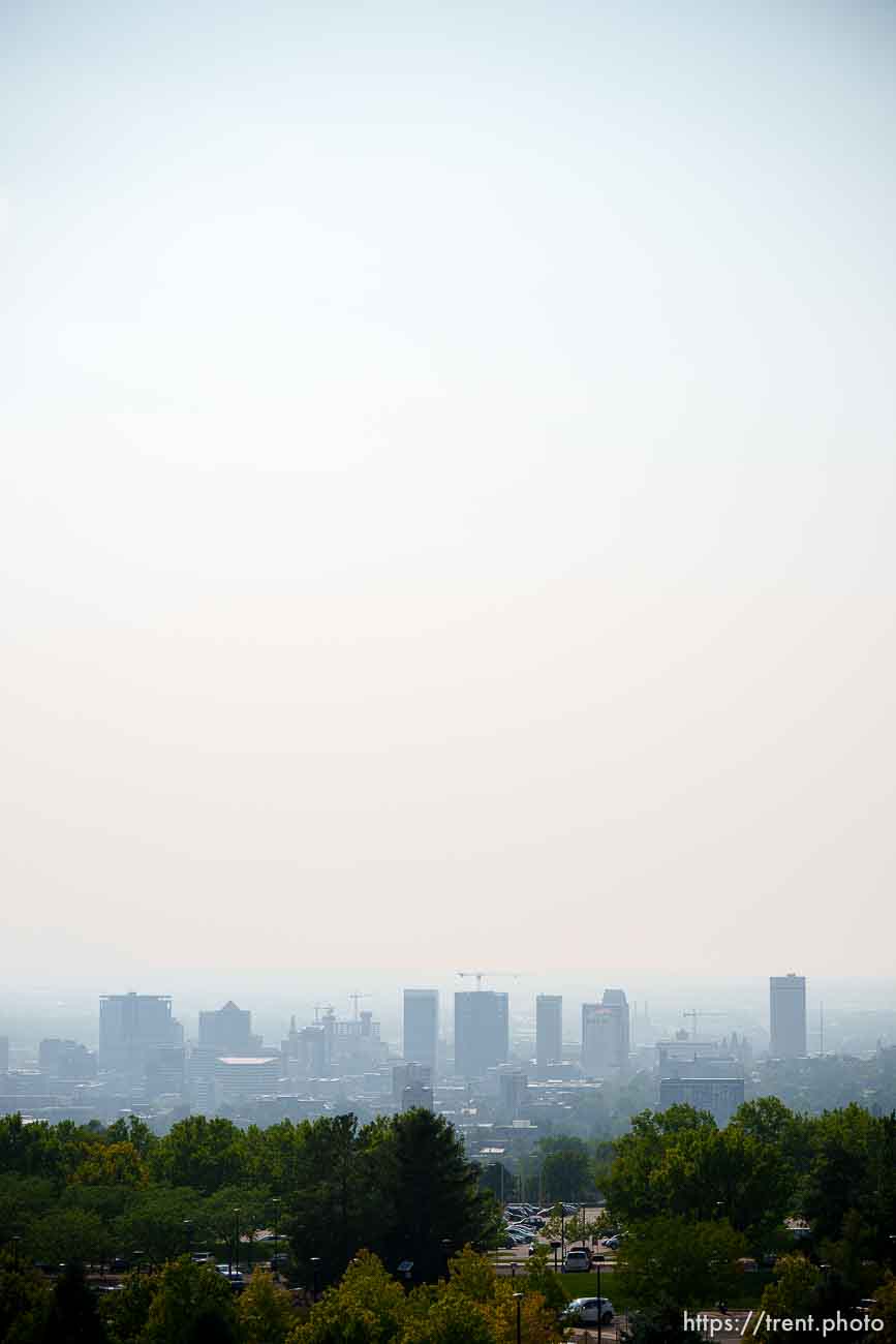 (Trent Nelson  |  The Salt Lake Tribune) Downtown and smoke over Salt Lake City on Friday, Aug. 20, 2021.