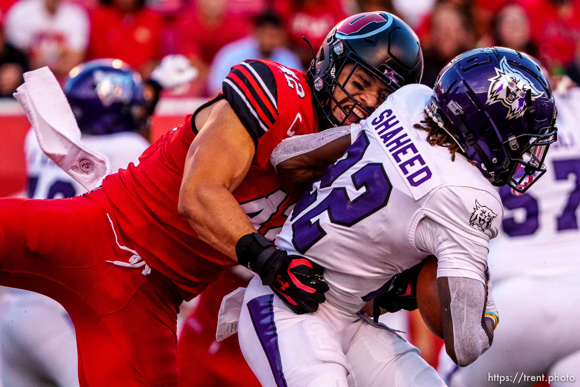 (Trent Nelson  |  The Salt Lake Tribune) Utah Utes defensive end Mika Tafua (42) tackles Weber State Wildcats wide receiver Rashid Shaheed (22) as the Utah Utes host the Weber State Wildcats in Salt Lake City on Thursday, Sept. 2, 2021.