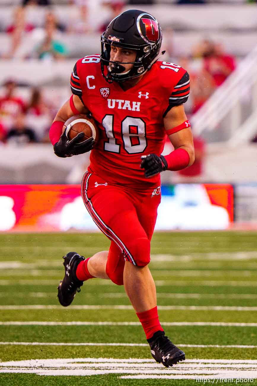 (Trent Nelson  |  The Salt Lake Tribune) Utah Utes wide receiver Britain Covey (18) returns a punt as the Utah Utes host the Weber State Wildcats in Salt Lake City on Thursday, Sept. 2, 2021.