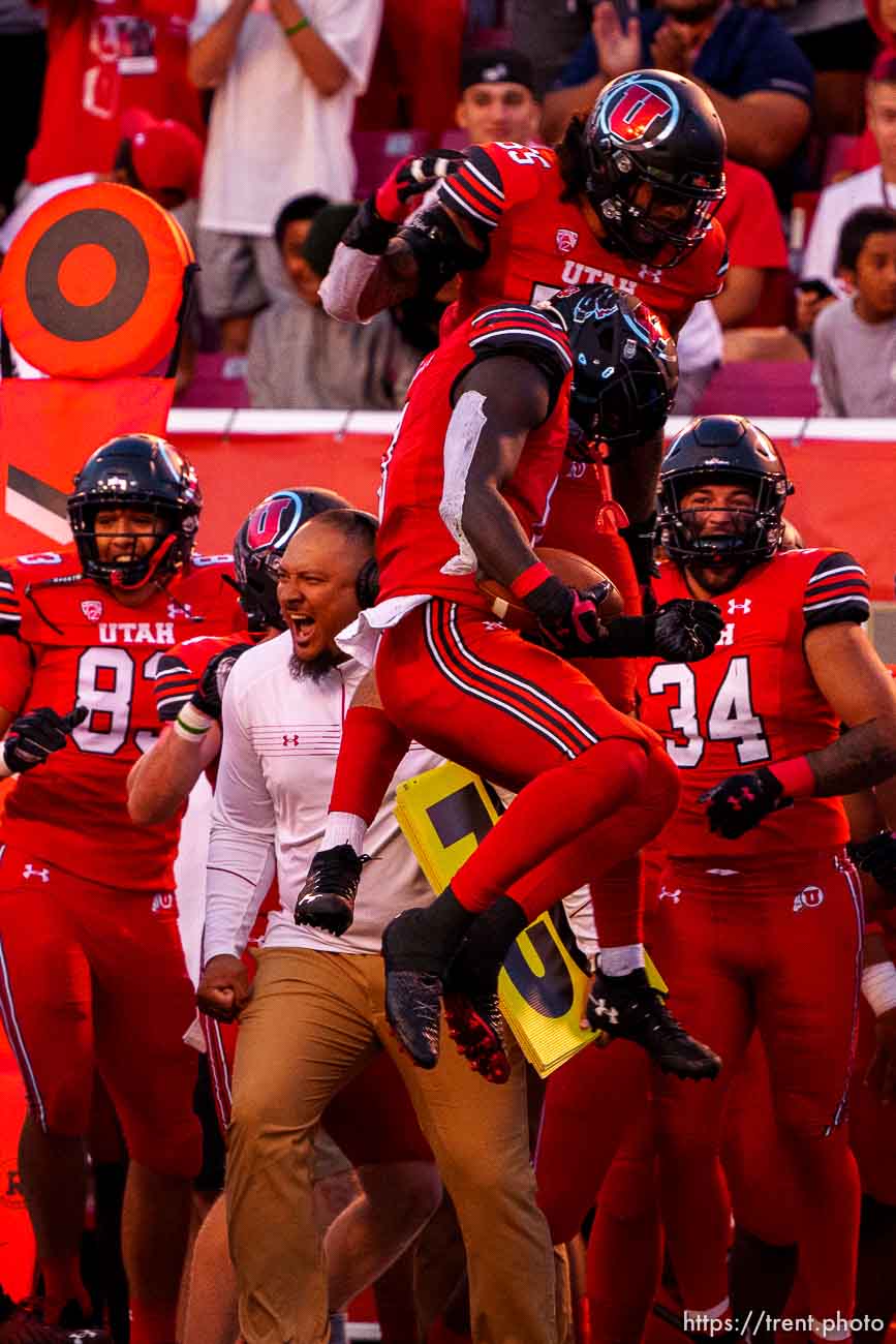 (Trent Nelson  |  The Salt Lake Tribune) Utah Utes linebacker Devin Lloyd (0) celebrates an interception as the Utah Utes host the Weber State Wildcats in Salt Lake City on Thursday, Sept. 2, 2021.