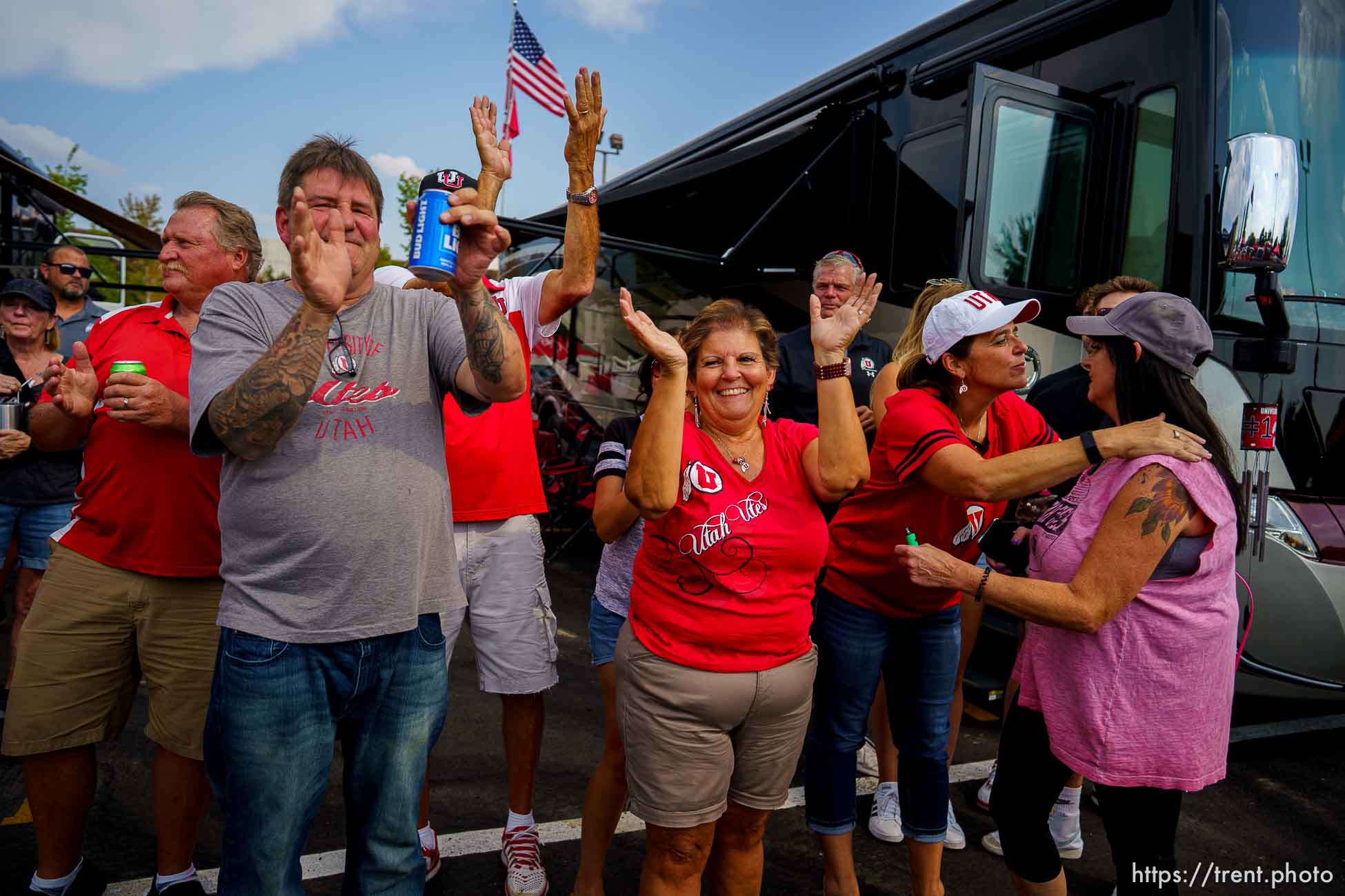 (Trent Nelson  |  The Salt Lake Tribune) Tailgaters cheer on the University of Utah Marching Band as the Utah Utes host the Weber State Wildcats in Salt Lake City on Thursday, Sept. 2, 2021.