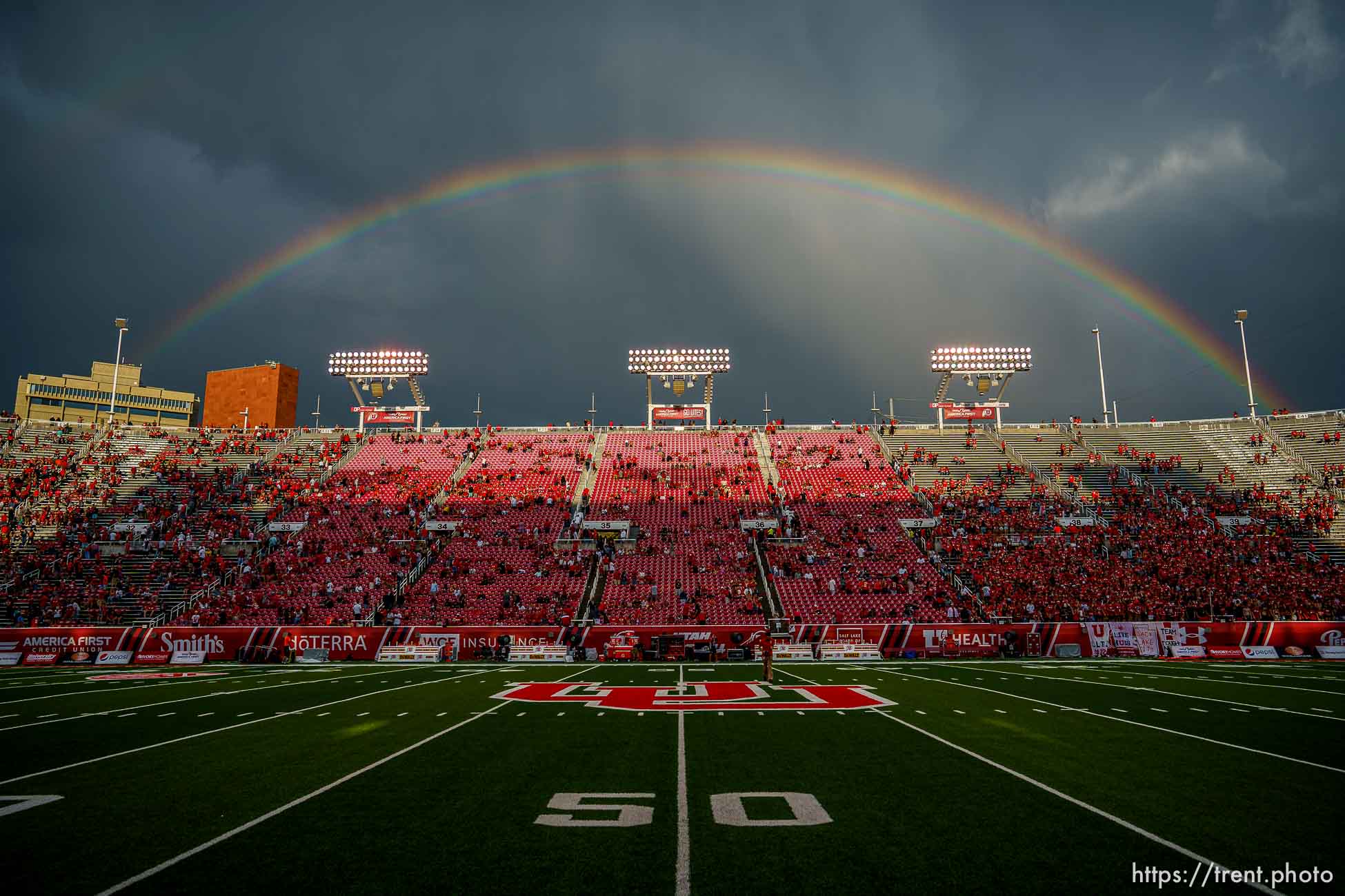 (Trent Nelson  |  The Salt Lake Tribune) A rainbow appears over Rice-Eccles Stadium after a lightning storm blew through as the Utah Utes host the Weber State Wildcats in Salt Lake City on Thursday, Sept. 2, 2021.