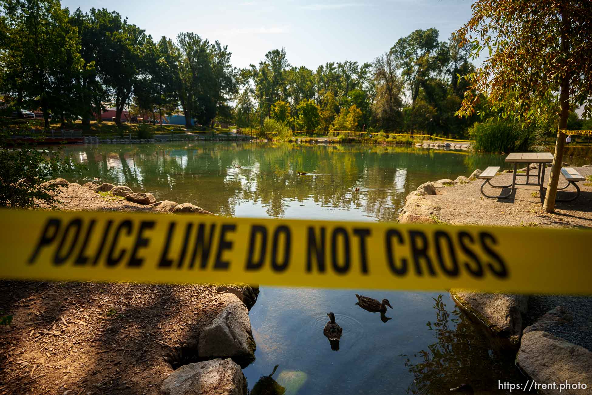 (Trent Nelson  |  The Salt Lake Tribune) Yellow tape surrounds the Fairmont Park Pond in Salt Lake City on Thursday, Sept. 9, 2021. Testing has revealed the potential presence of mercury.