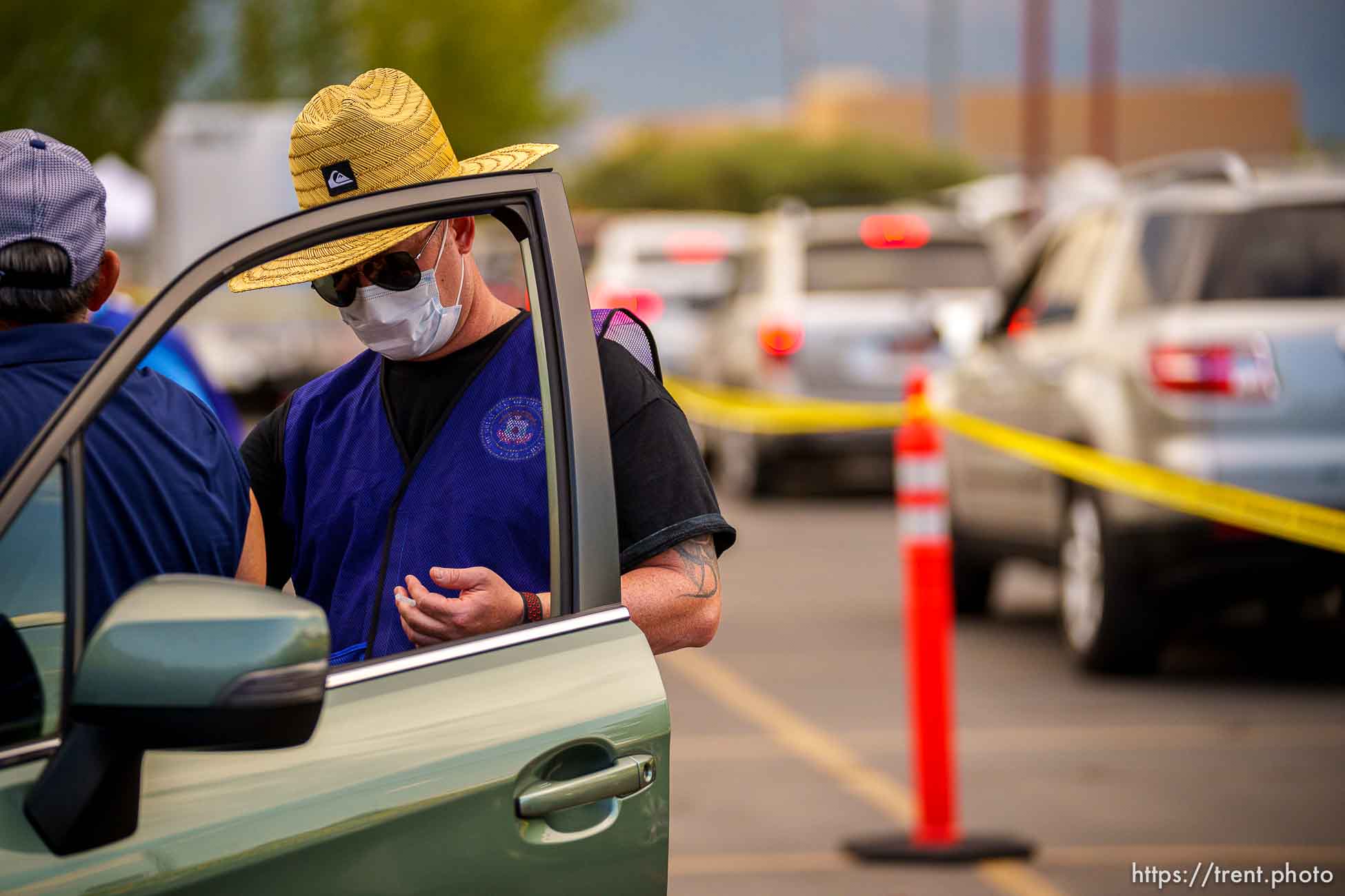 (Trent Nelson  |  The Salt Lake Tribune) Spencer Lowe administers a dose of the Pfizer COVID-19 vaccine at a drive-thru event organized by the Utah County Health Department in Spanish Fork on Friday, Sept. 10, 2021.