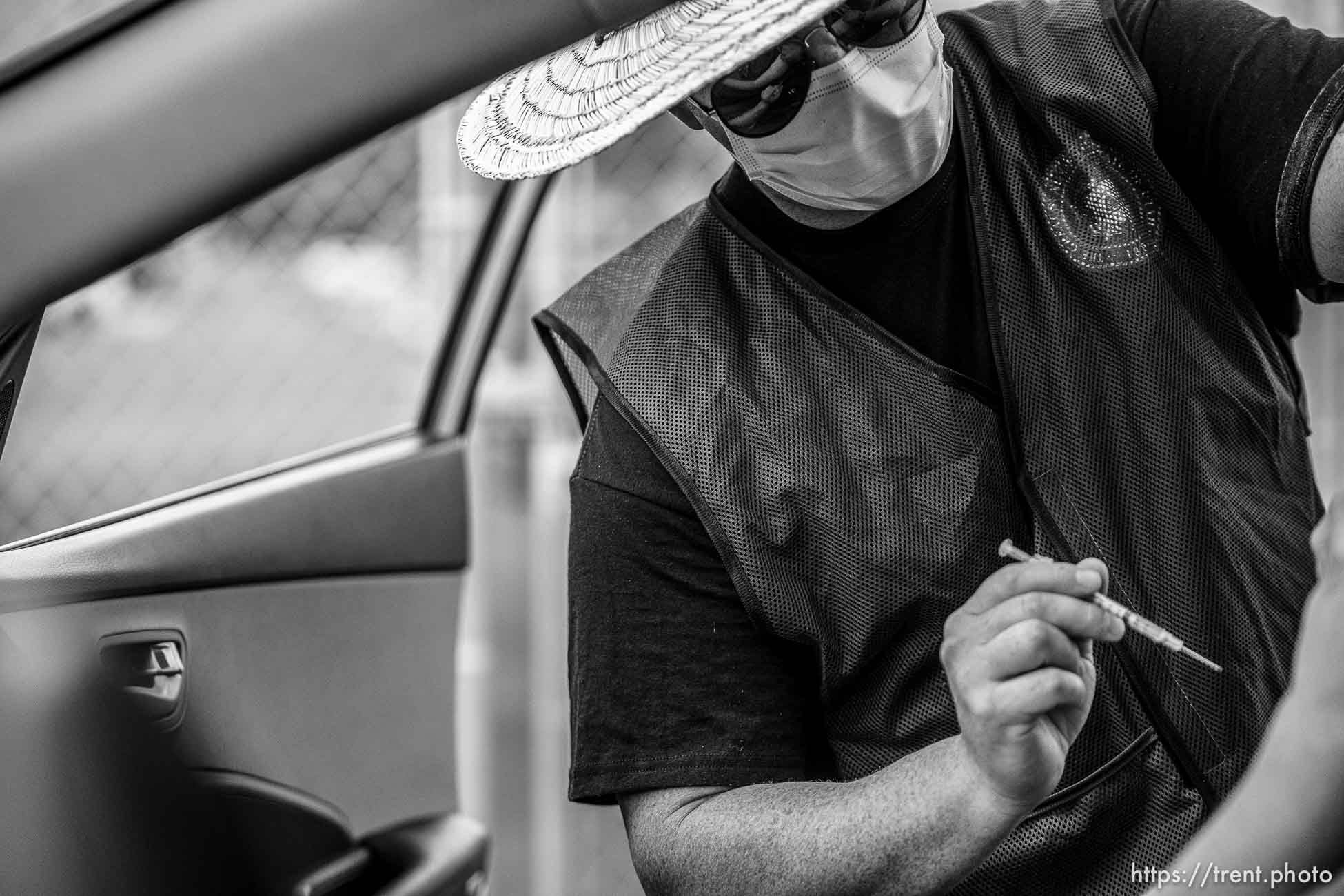 (Trent Nelson  |  The Salt Lake Tribune) Spencer Lowe administers a dose of the Pfizer COVID-19 vaccine at a drive-thru event organized by the Utah County Health Department in Spanish Fork on Friday, Sept. 10, 2021.