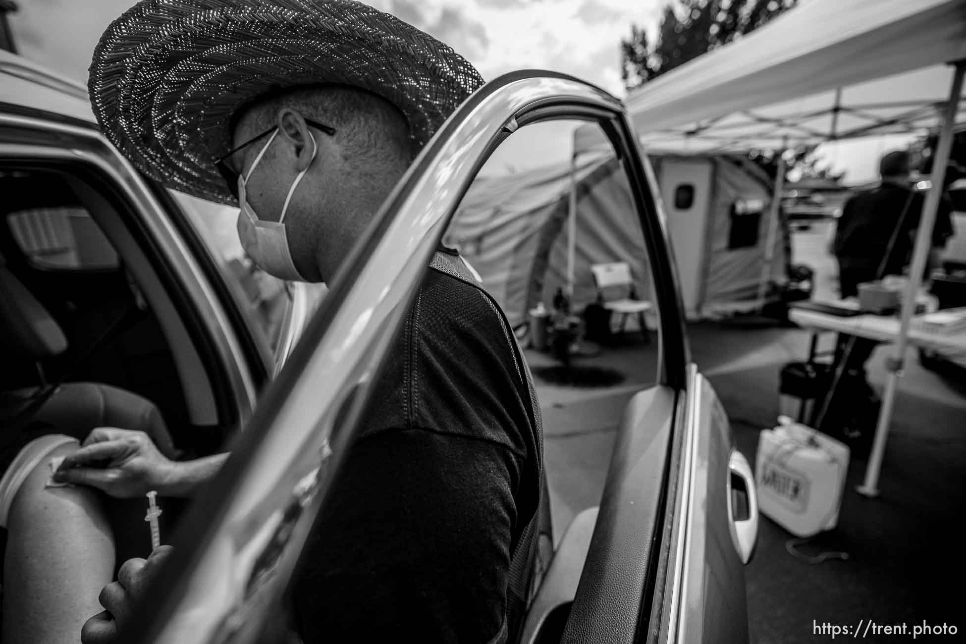 (Trent Nelson  |  The Salt Lake Tribune) Spencer Lowe administers a dose of the Pfizer COVID-19 vaccine at a drive-thru event organized by the Utah County Health Department in Spanish Fork on Friday, Sept. 10, 2021.