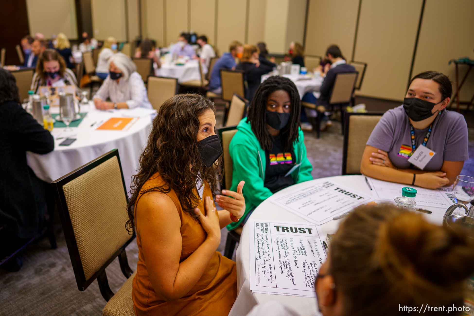 (Trent Nelson  |  The Salt Lake Tribune) Participants sharing thoughts and ideas at a Solutions Summit hosted by The Innovation Lab in West Valley City on Monday, Sept. 13, 2021. From left, Shireen Ghorbani, Eva Means, and Laura Schnurr.