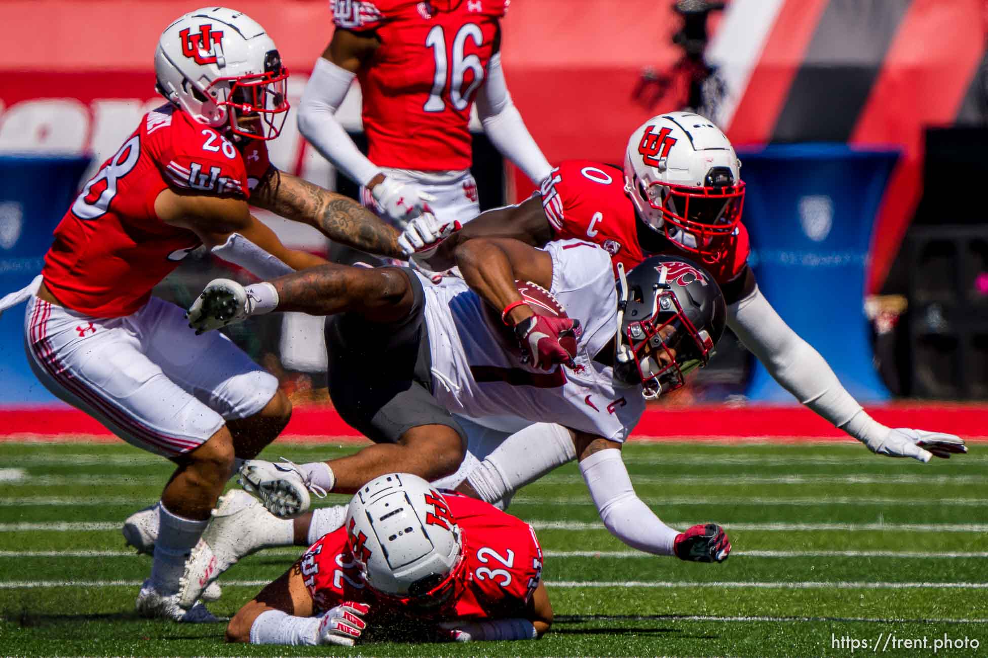 (Trent Nelson  |  The Salt Lake Tribune) Utah defenders stop Washington State Cougars wide receiver Travell Harris (1)  as the University of Utah hosts Washington State, NCAA football in Salt Lake City on Saturday, Sept. 25, 2021.