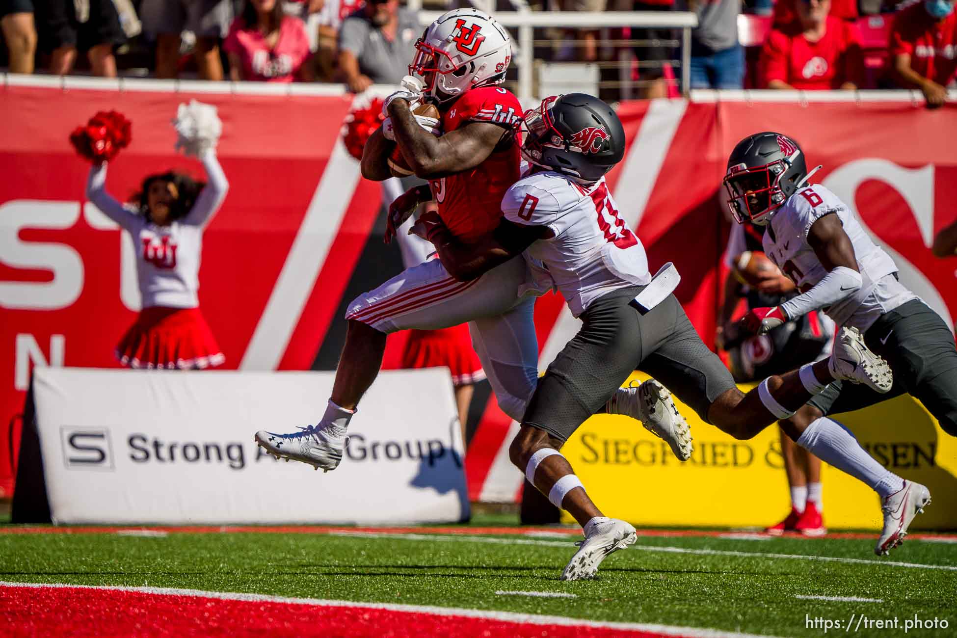 (Trent Nelson  |  The Salt Lake Tribune) Utah Utes running back TJ Pledger (5) runs for a touchdown as the University of Utah hosts Washington State, NCAA football in Salt Lake City on Saturday, Sept. 25, 2021.