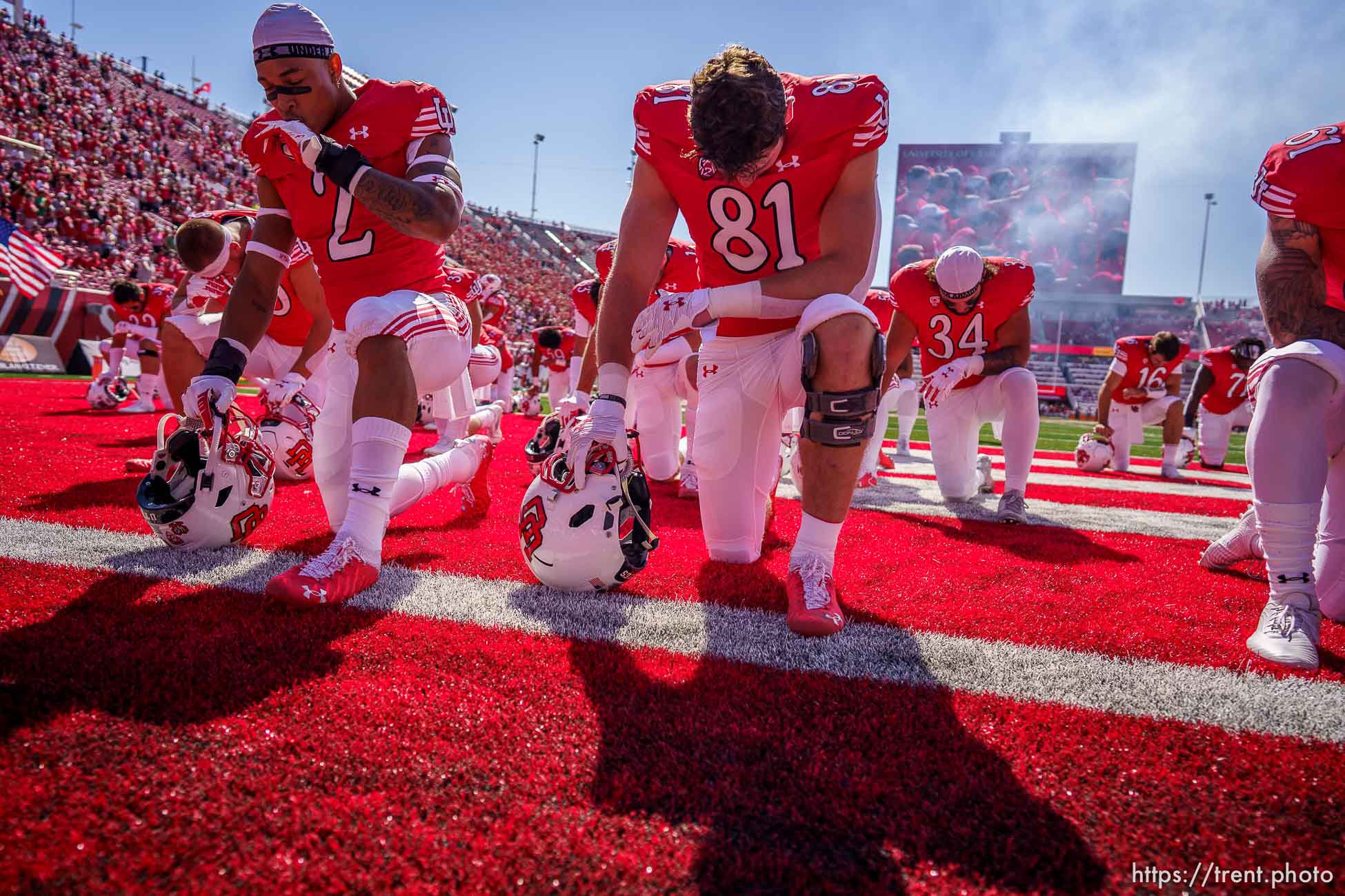 (Trent Nelson  |  The Salt Lake Tribune) Players pray before the game as the University of Utah hosts Washington State, NCAA football in Salt Lake City on Saturday, Sept. 25, 2021.