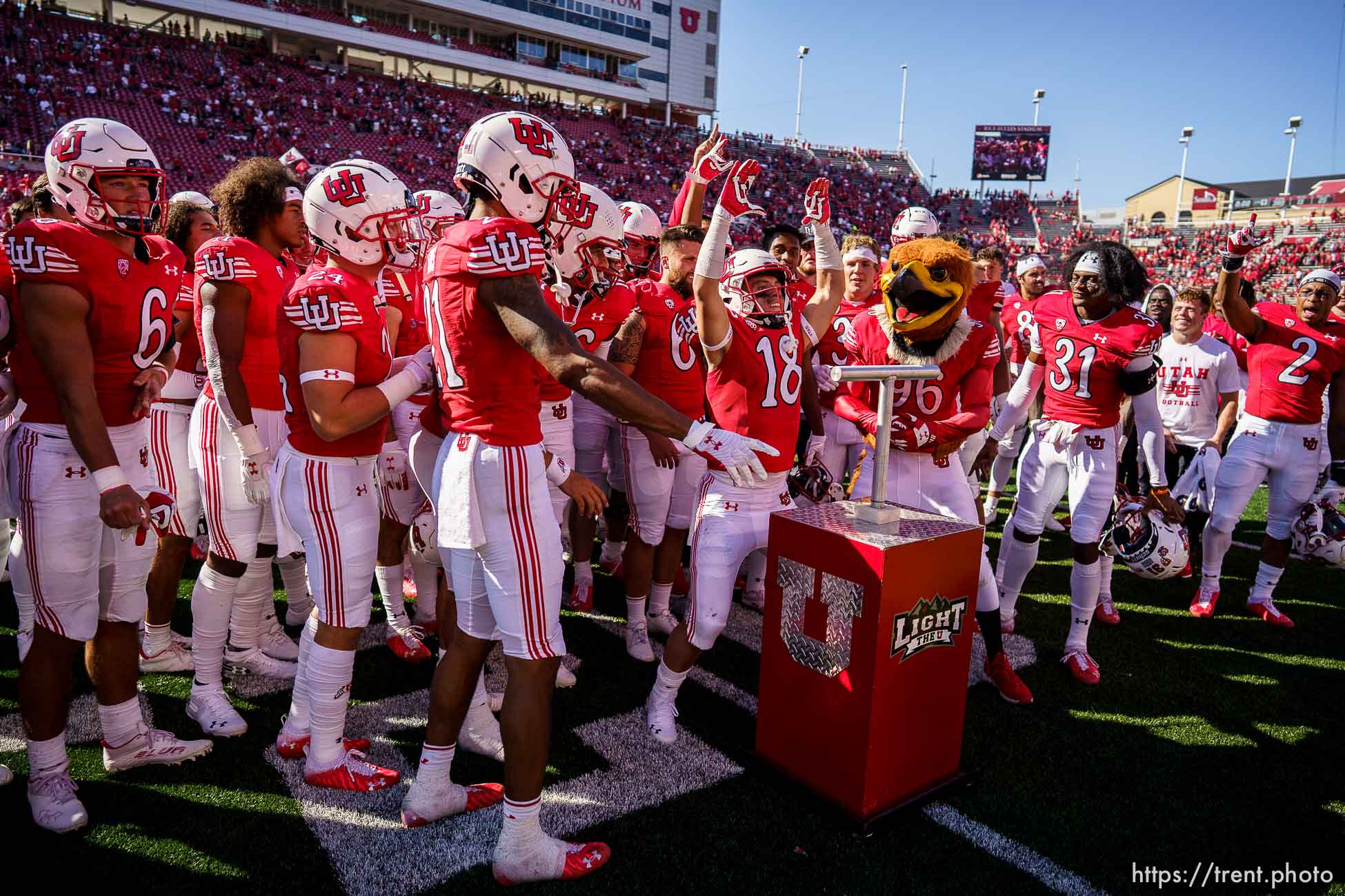 (Trent Nelson  |  The Salt Lake Tribune) Utah Utes wide receiver Britain Covey (18) and teammates celebrate as the University of Utah hosts Washington State, NCAA football in Salt Lake City on Saturday, Sept. 25, 2021.