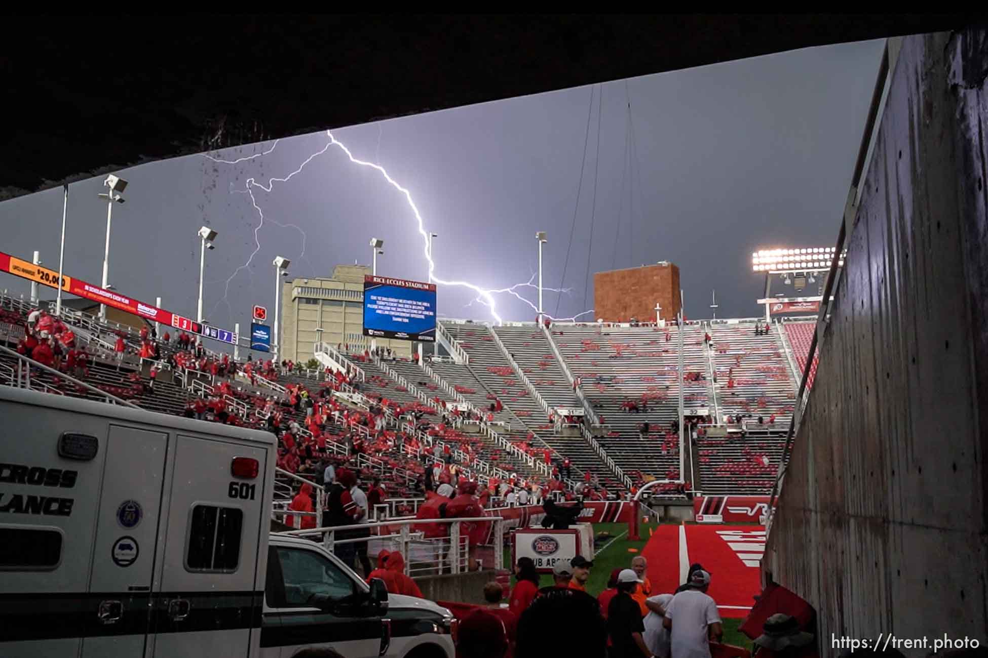 (Trent Nelson  |  The Salt Lake Tribune) Lightning flashes over Rice-Eccles Stadium as a storm blew through as the Utah Utes host the Weber State Wildcats in Salt Lake City on Thursday, Sept. 2, 2021.