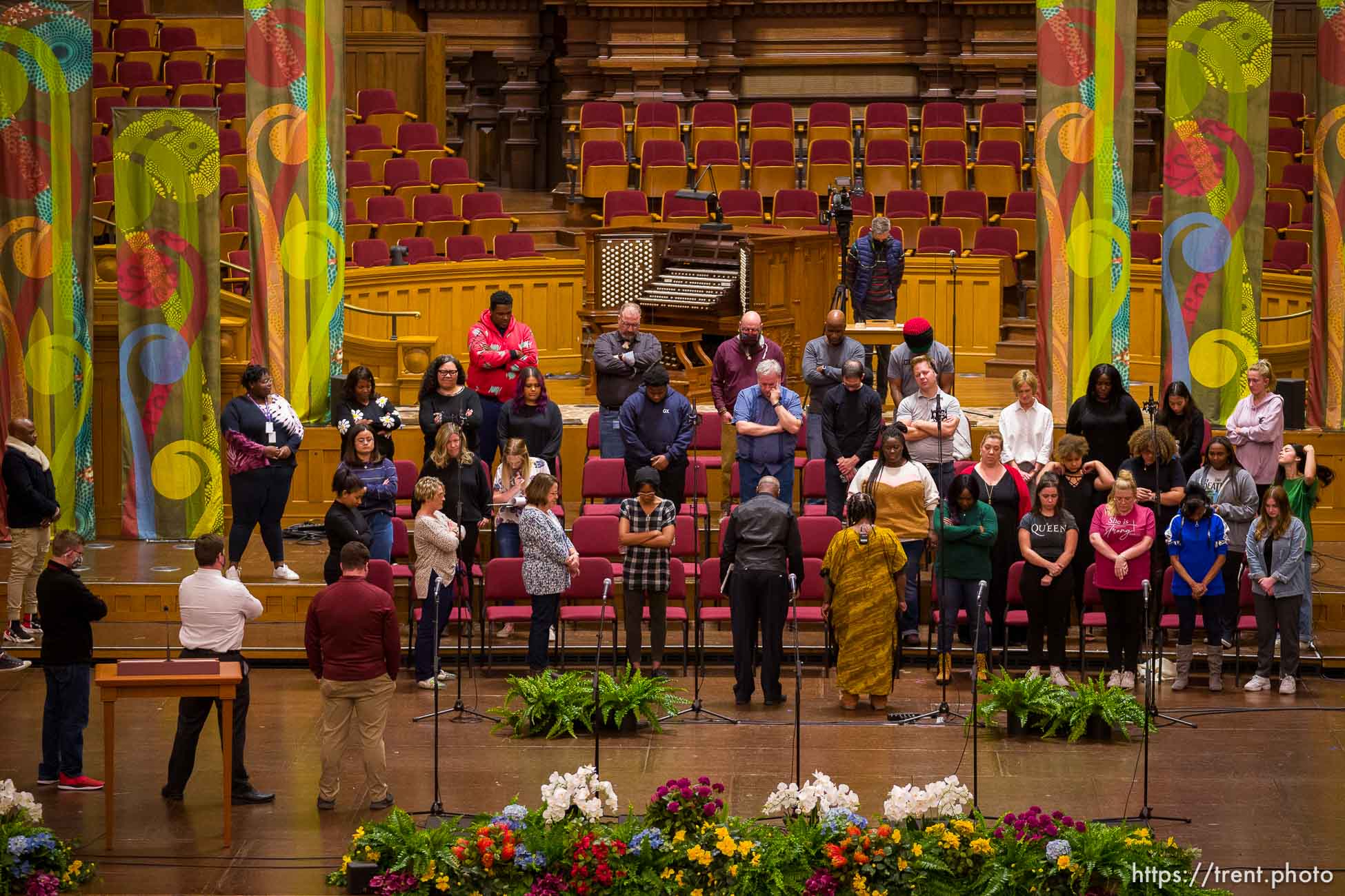 (Trent Nelson  |  The Salt Lake Tribune) The Debra Bonner Unity Gospel Choir prays before rehearsal in the Tabernacle for a celebration of the 50th aniversary of the Genesis Group, in Salt Lake City on Tuesday, Oct. 19, 2021.