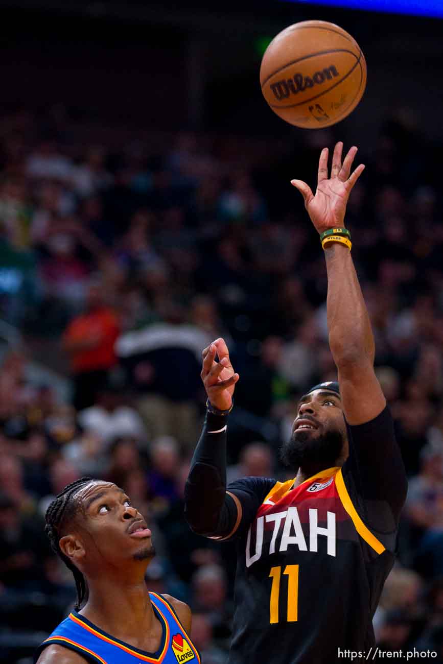 (Trent Nelson  |  The Salt Lake Tribune) Utah Jazz guard Mike Conley (11) and Oklahoma City Thunder guard Shai Gilgeous-Alexander (2) as the Utah Jazz host the Oklahoma City Thunder, NBA basketball in Salt Lake City on Wednesday, Oct. 20, 2021.