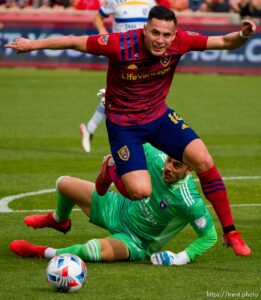 (Trent Nelson  |  The Salt Lake Tribune) Real Salt Lake forward Rubio Rubin (14) leaps over San Jose Earthquakes goalkeeper JT Marcinkowski (1) as Real Salt Lake hosts San Jose Earthquakes, MLS Soccer in Sandy on Saturday, Oct. 30, 2021.