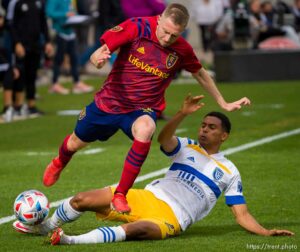 (Trent Nelson  |  The Salt Lake Tribune) Real Salt Lake defender Andrew Brody (2) is brought down by San Jose Earthquakes defender Marcos Lopez (27) as Real Salt Lake hosts San Jose Earthquakes, MLS Soccer in Sandy on Saturday, Oct. 30, 2021.