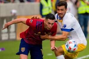 (Trent Nelson  |  The Salt Lake Tribune) San Jose Earthquakes defender Oswaldo Alanis (4) picks up a yellow card defending Real Salt Lake forward Rubio Rubin (14) as Real Salt Lake hosts San Jose Earthquakes, MLS Soccer in Sandy on Saturday, Oct. 30, 2021.