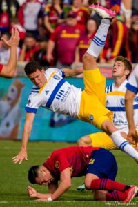 (Trent Nelson  |  The Salt Lake Tribune) San Jose Earthquakes defender Nathan (13) flies over Real Salt Lake forward Rubio Rubin (14) as Real Salt Lake hosts San Jose Earthquakes, MLS Soccer in Sandy on Saturday, Oct. 30, 2021.