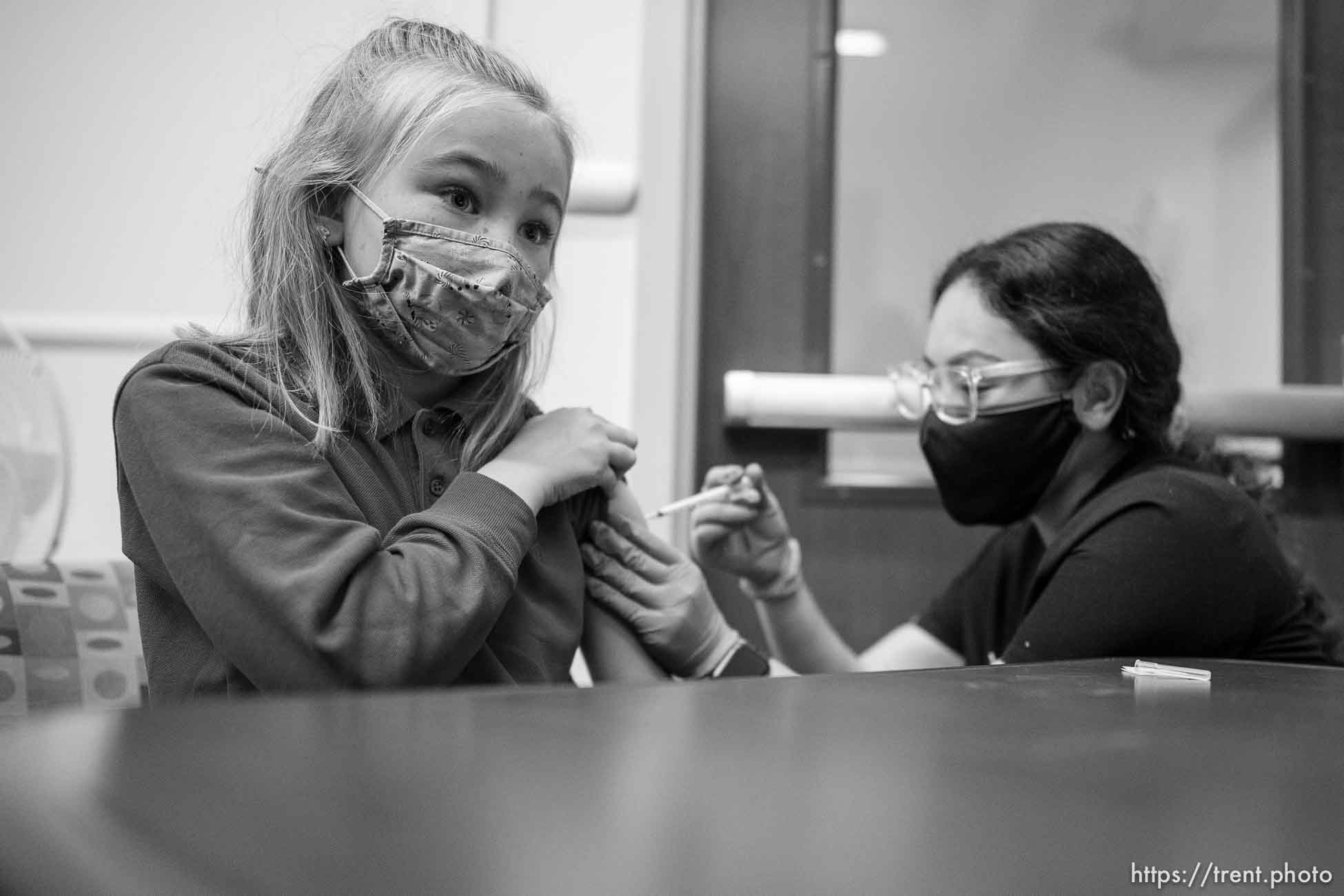 (Trent Nelson  |  The Salt Lake Tribune) Elizabeth Woodbury is vaccinated against COVID-19 by Tenzin Drongsar at South Main Public Health Center in South Salt Lake on Wednesday, Nov. 3, 2021.