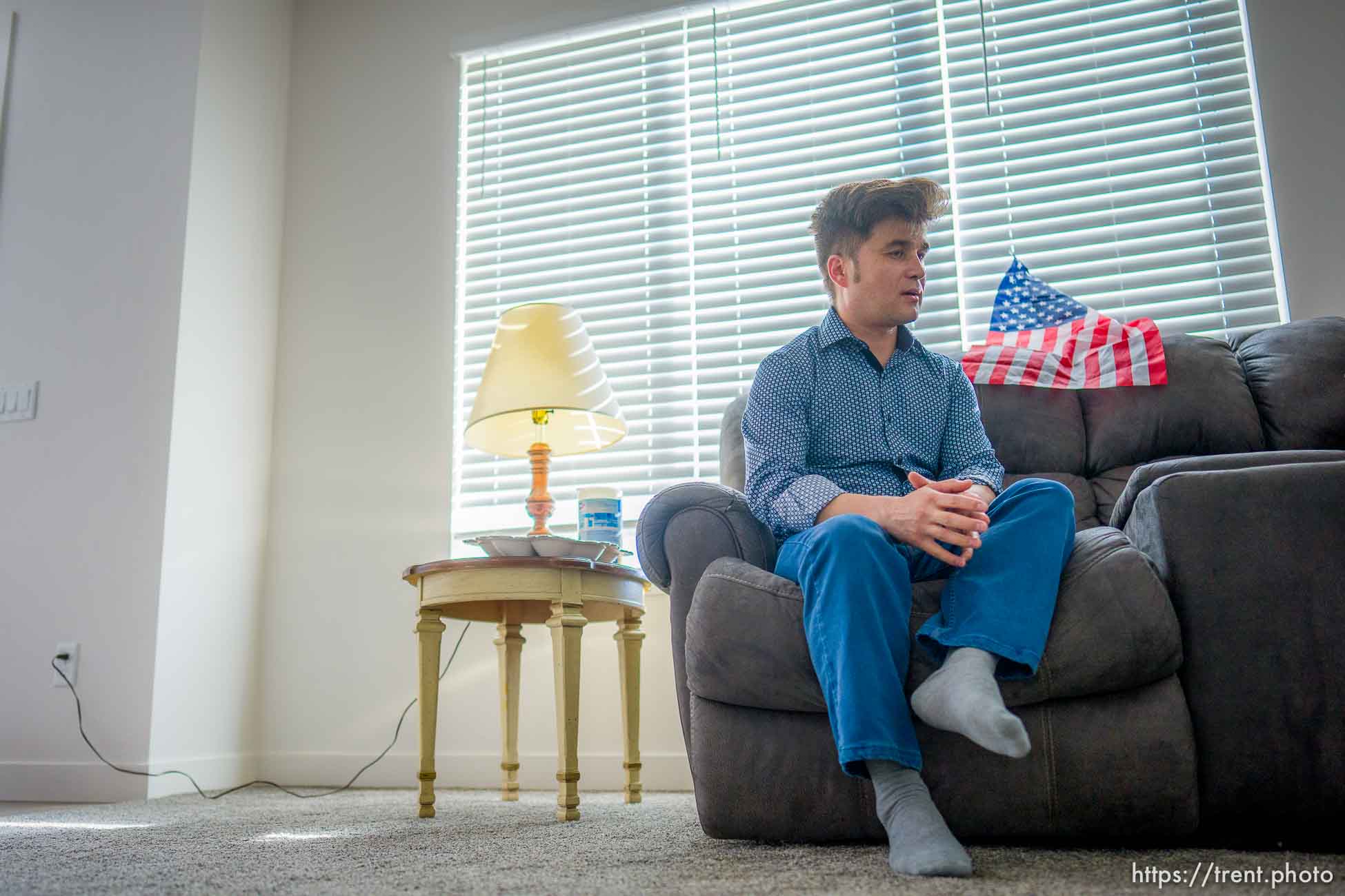 (Trent Nelson  |  The Salt Lake Tribune) Azim Kakaie, who recently came with his family from Afghanistan, in his North Salt Lake home on Friday, Nov. 5, 2021.