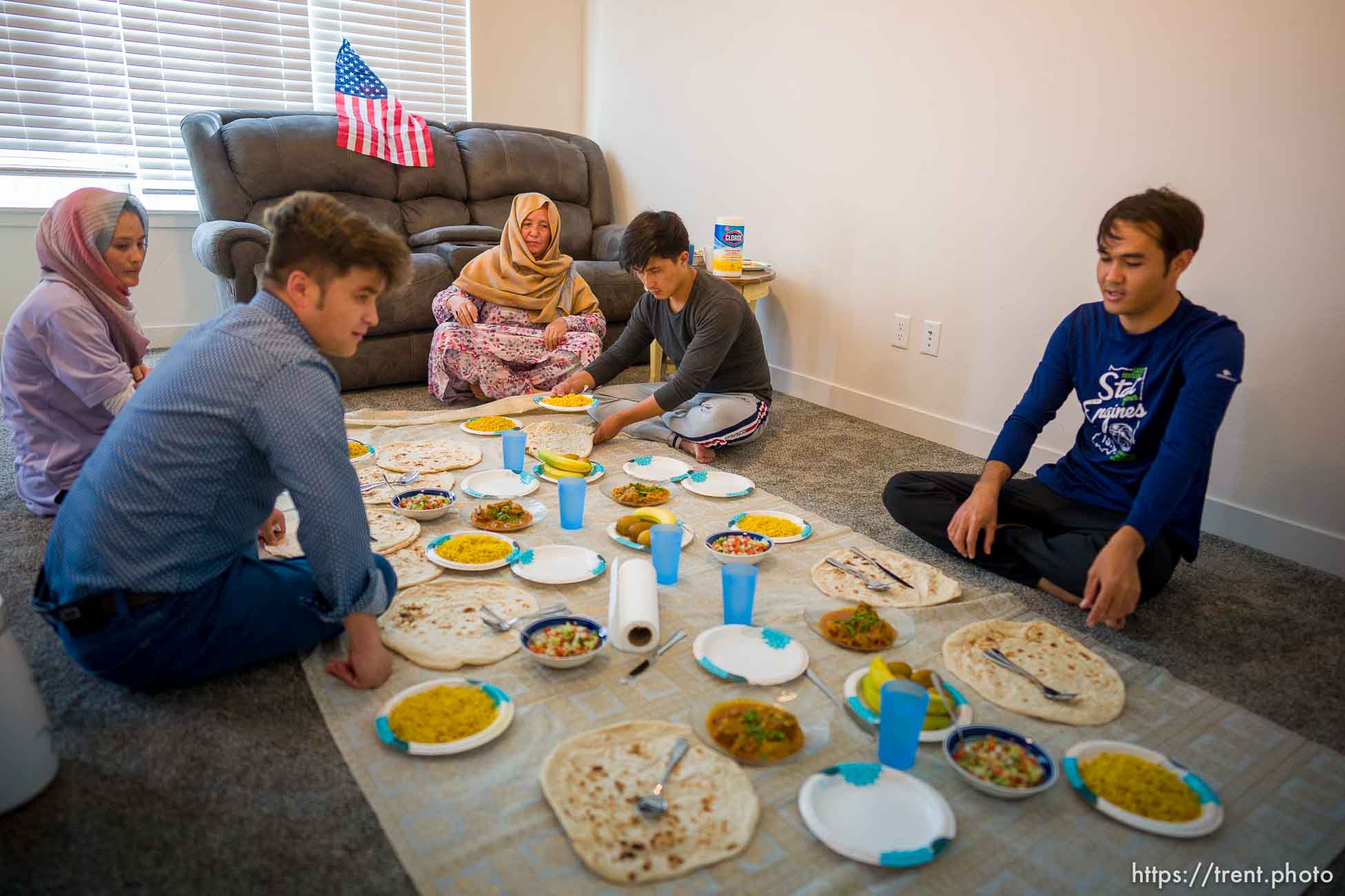 (Trent Nelson  |  The Salt Lake Tribune) Azim Kakaie sits down for lunch with his family in their North Salt Lake home on Friday, Nov. 5, 2021. From left, Shazia Kakaie, Azim Kakaie, Hawa, Wali Kakaie, and Arif Muradi.