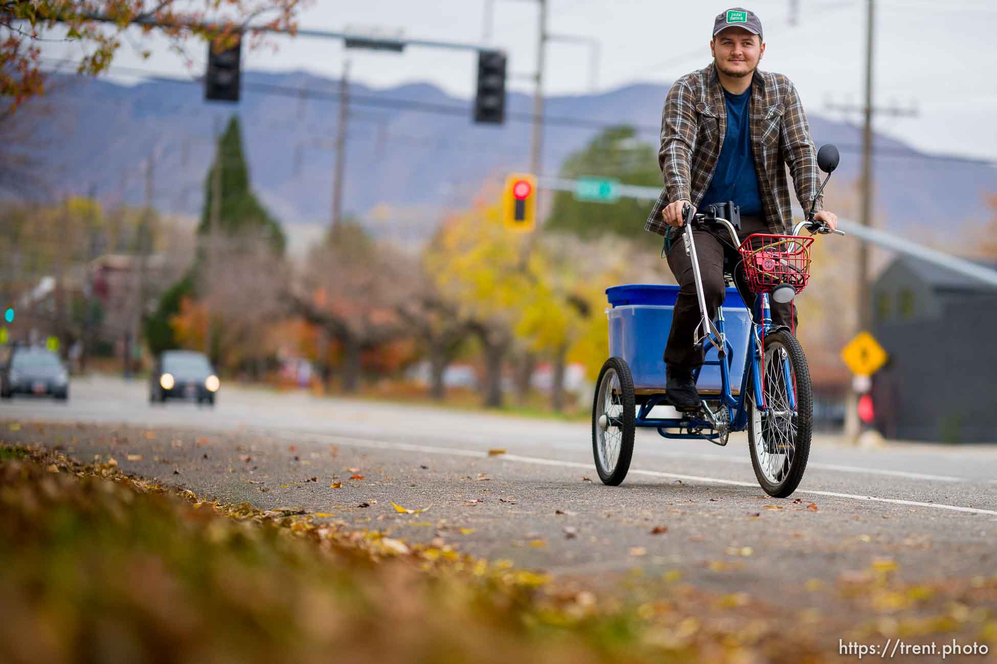 (Trent Nelson  |  The Salt Lake Tribune) John Warnock with the bike he rides around Salt Lake City picking up trash, on Thursday, Nov. 11, 2021.