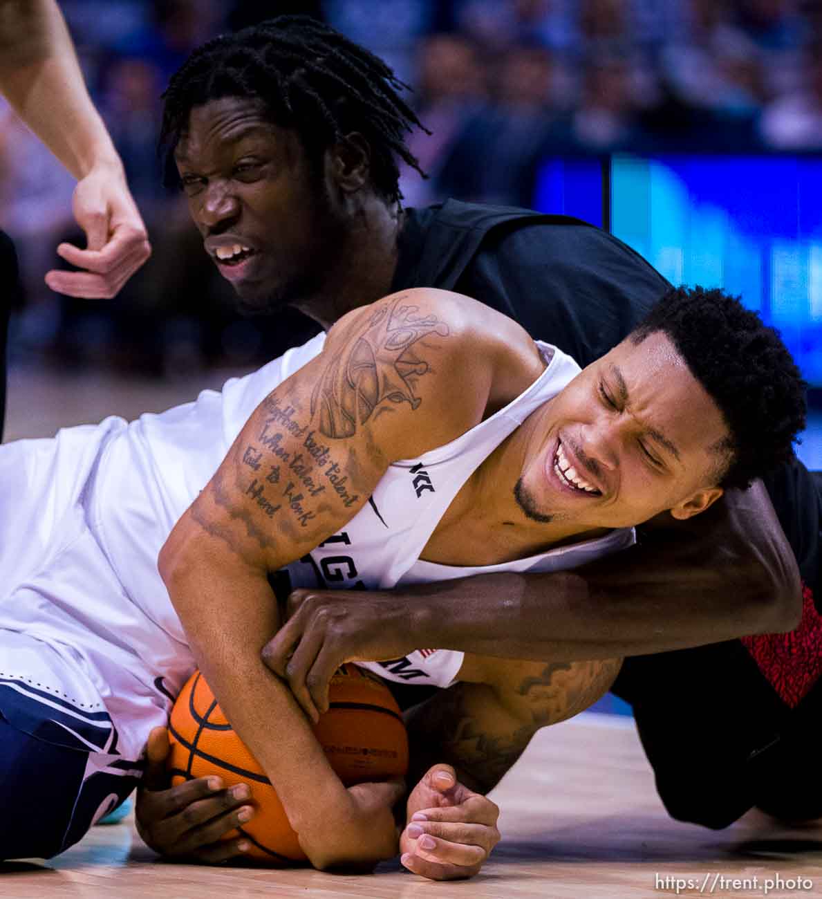 (Trent Nelson  |  The Salt Lake Tribune) Brigham Young Cougars guard Te'Jon Lucas (3) and San Diego State Aztecs forward Nathan Mensah (31) as BYU hosts San Diego State, NCAA basketball in Provo on Friday, Nov. 12, 2021.