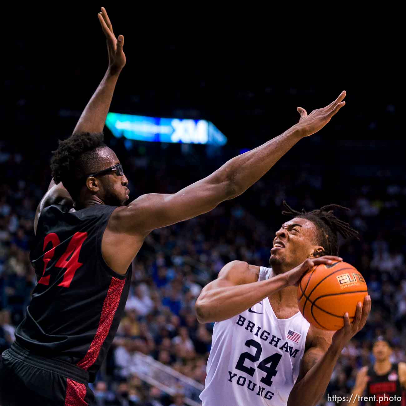 (Trent Nelson  |  The Salt Lake Tribune) San Diego State Aztecs guard Tyler Broughton (24) Brigham Young Cougars forward Seneca Knight (24) as BYU hosts San Diego State, NCAA basketball in Provo on Friday, Nov. 12, 2021.