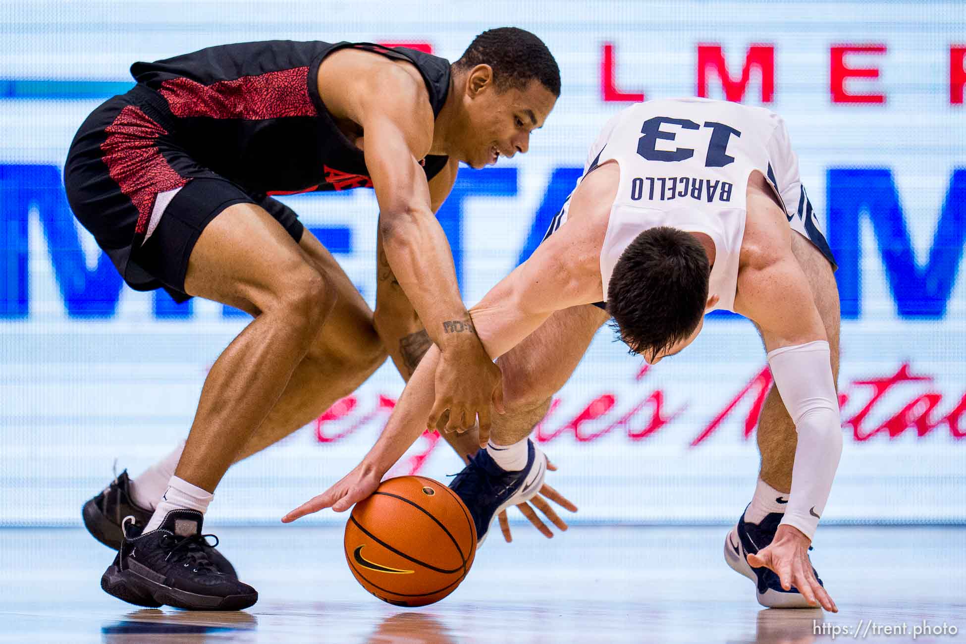 (Trent Nelson  |  The Salt Lake Tribune) Brigham Young Cougars guard Alex Barcello (13) steals the ball from San Diego State Aztecs forward Keshad Johnson (0) as BYU hosts San Diego State, NCAA basketball in Provo on Friday, Nov. 12, 2021.