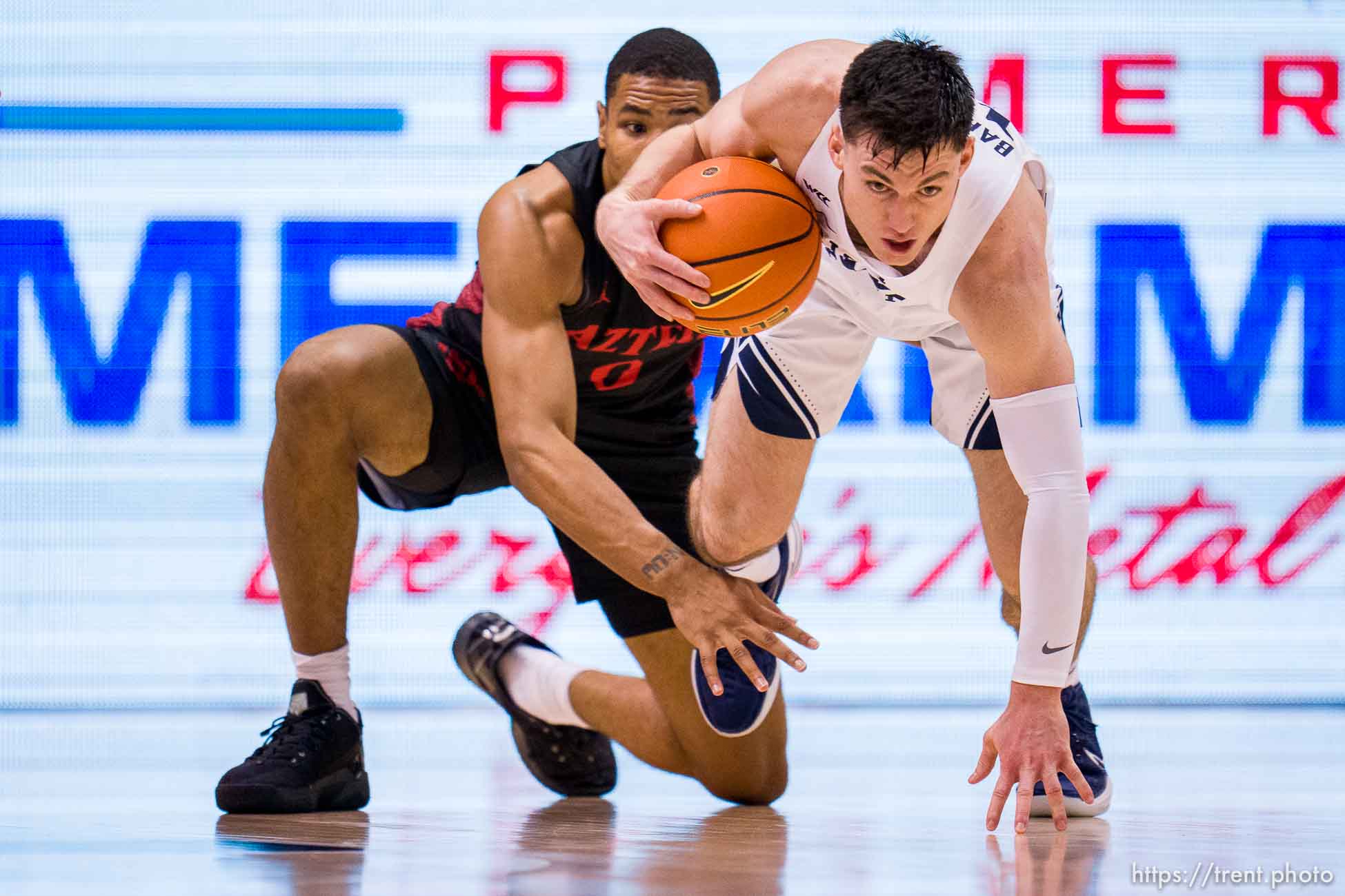 (Trent Nelson  |  The Salt Lake Tribune) Brigham Young Cougars guard Alex Barcello (13) steals the ball from San Diego State Aztecs forward Keshad Johnson (0) as BYU hosts San Diego State, NCAA basketball in Provo on Friday, Nov. 12, 2021.