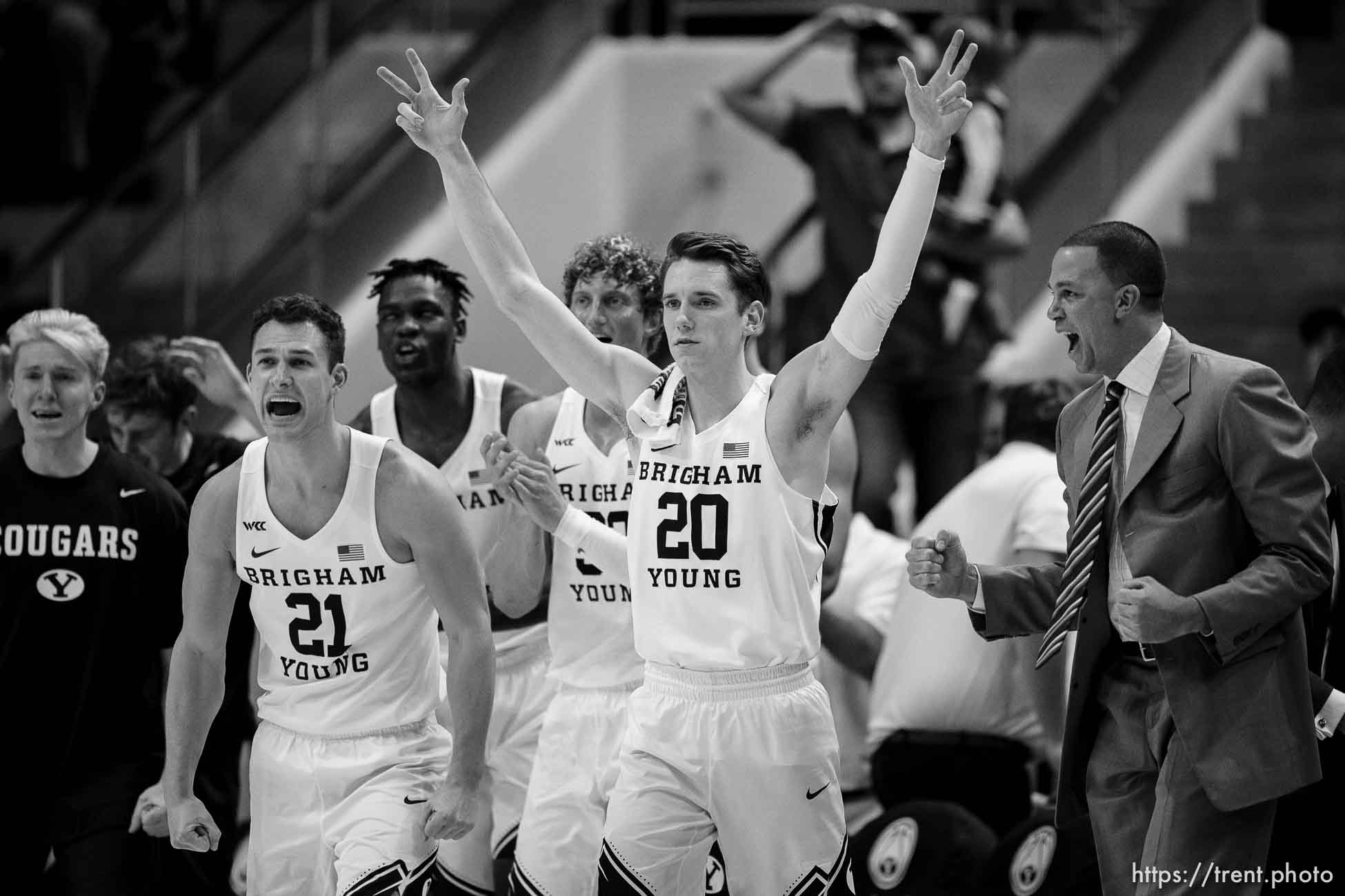 (Trent Nelson  |  The Salt Lake Tribune) BYU players celebrate a 2 point first half lead as BYU hosts San Diego State, NCAA basketball in Provo on Friday, Nov. 12, 2021. Brigham Young Cougars guard Trevin Knell (21) and Brigham Young Cougars guard Spencer Johnson (20).