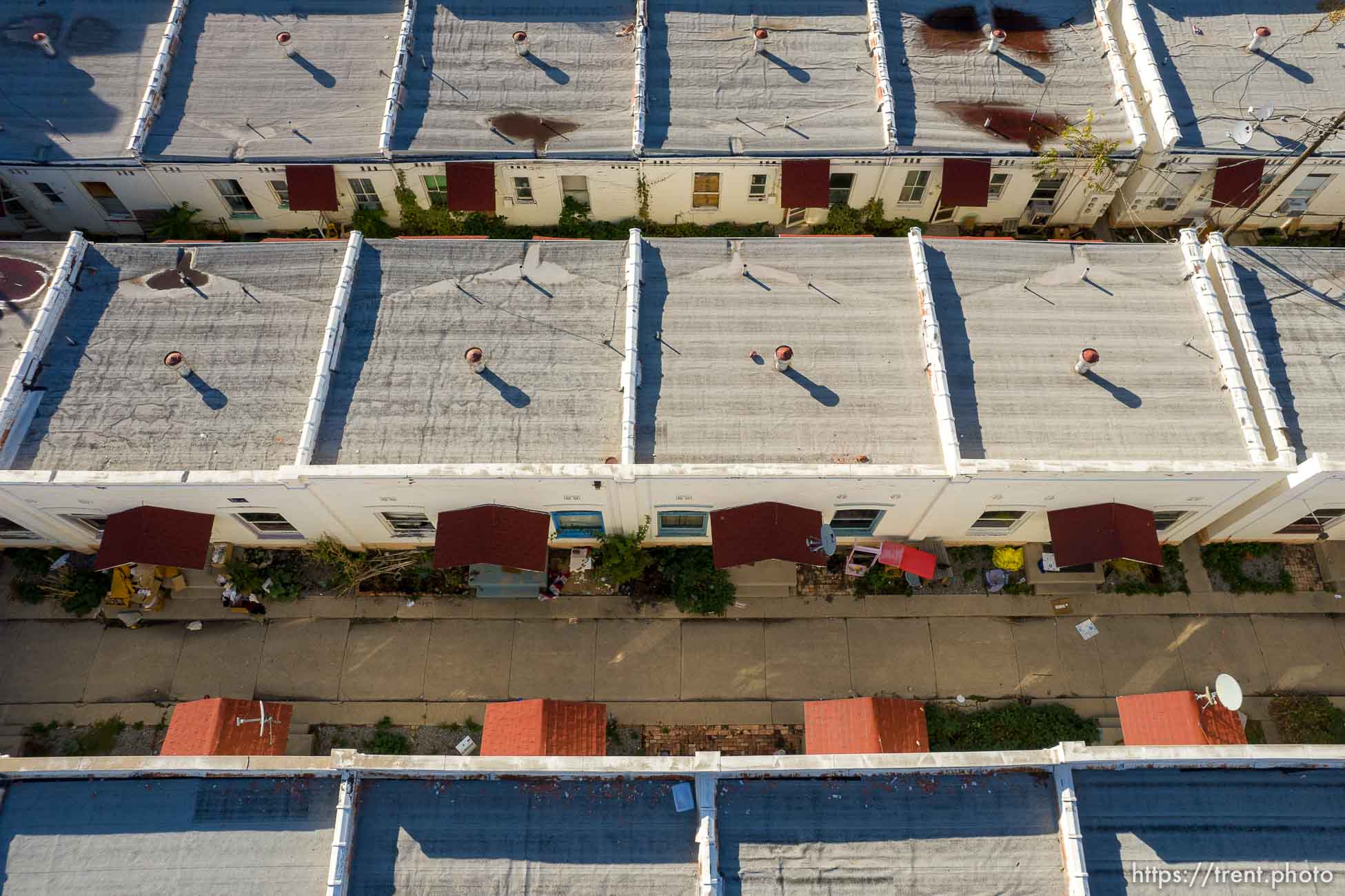 (Trent Nelson  |  The Salt Lake Tribune) LaFrance Apartments in Salt Lake City on Friday, Nov. 12, 2021. The property is now emptied of its residents and fenced off for demolition. This cluster of about 60 white row houses and walk-up apartments just east of the Greek Orthodox Cathedral has been an enclave of affordable housing for years.