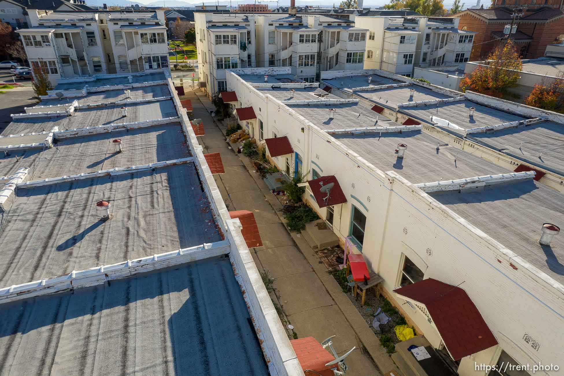 (Trent Nelson  |  The Salt Lake Tribune) LaFrance Apartments in Salt Lake City on Friday, Nov. 12, 2021. The property is now emptied of its residents and fenced off for demolition. This cluster of about 60 white row houses and walk-up apartments just east of the Greek Orthodox Cathedral has been an enclave of affordable housing for years.